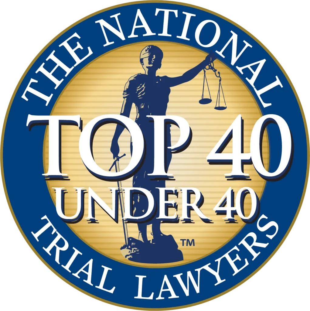 Emblem featuring Lady Justice with scales and sword, text "The National Trial Lawyers Top 40 Under 40.